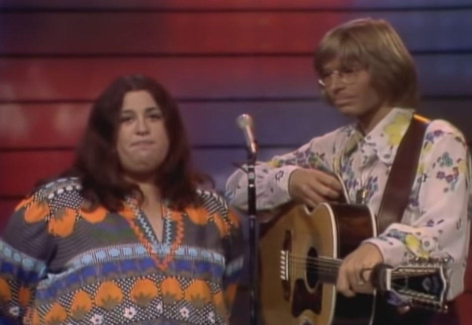 Here's a video of Cass Elliot and John Denver singing Leaving On A Je